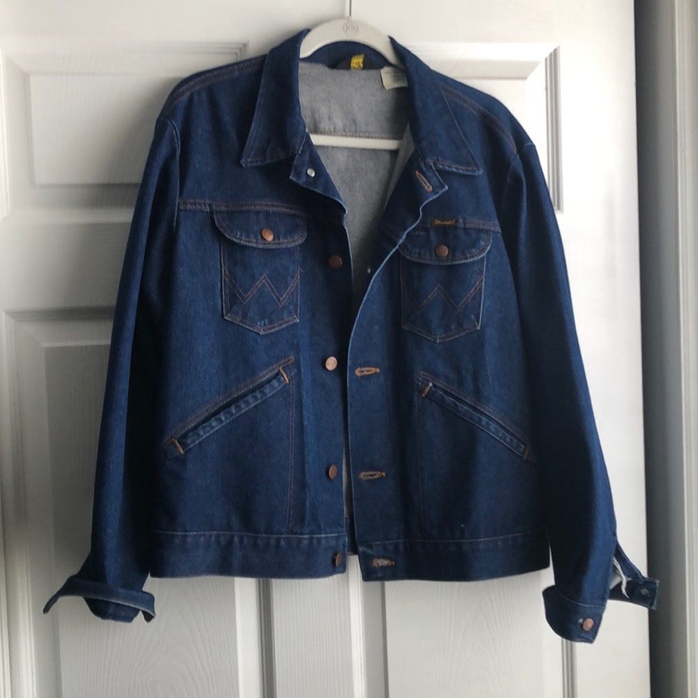 Vintage Wrangler jean jacket, never worn, no tags. Size large.